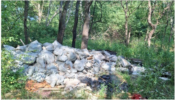 Росприроднадзор обнаружил свалку отходов и нефтепродукты в Бурнаковской низине - фото 1