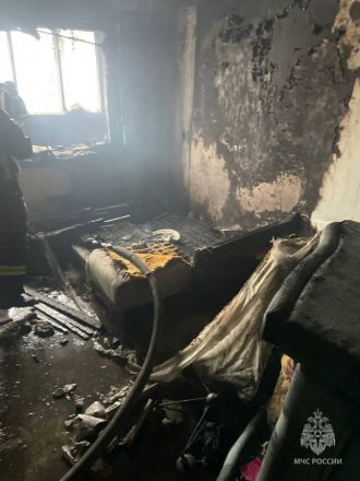 Женщина пострадала на пожаре в многоэтажке в Нижнем Новгороде - фото 3